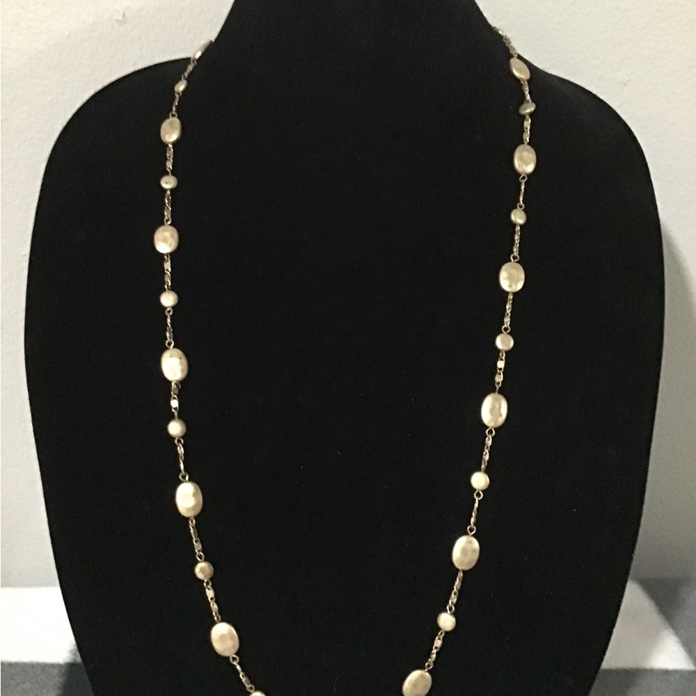 Lia Sofia 18” knecklace. Brass in color. Has extender and lobster claw clasp.